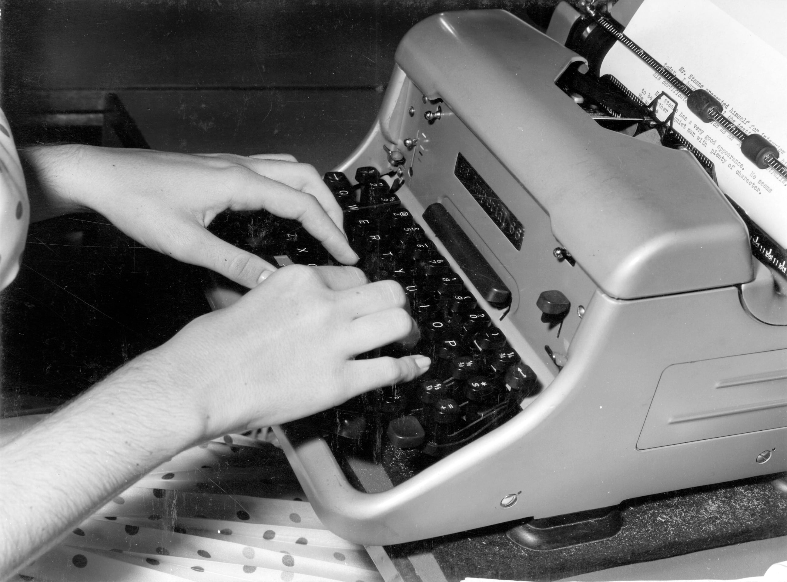 Illustration of someone typing on a keyboard, representing the content writing process