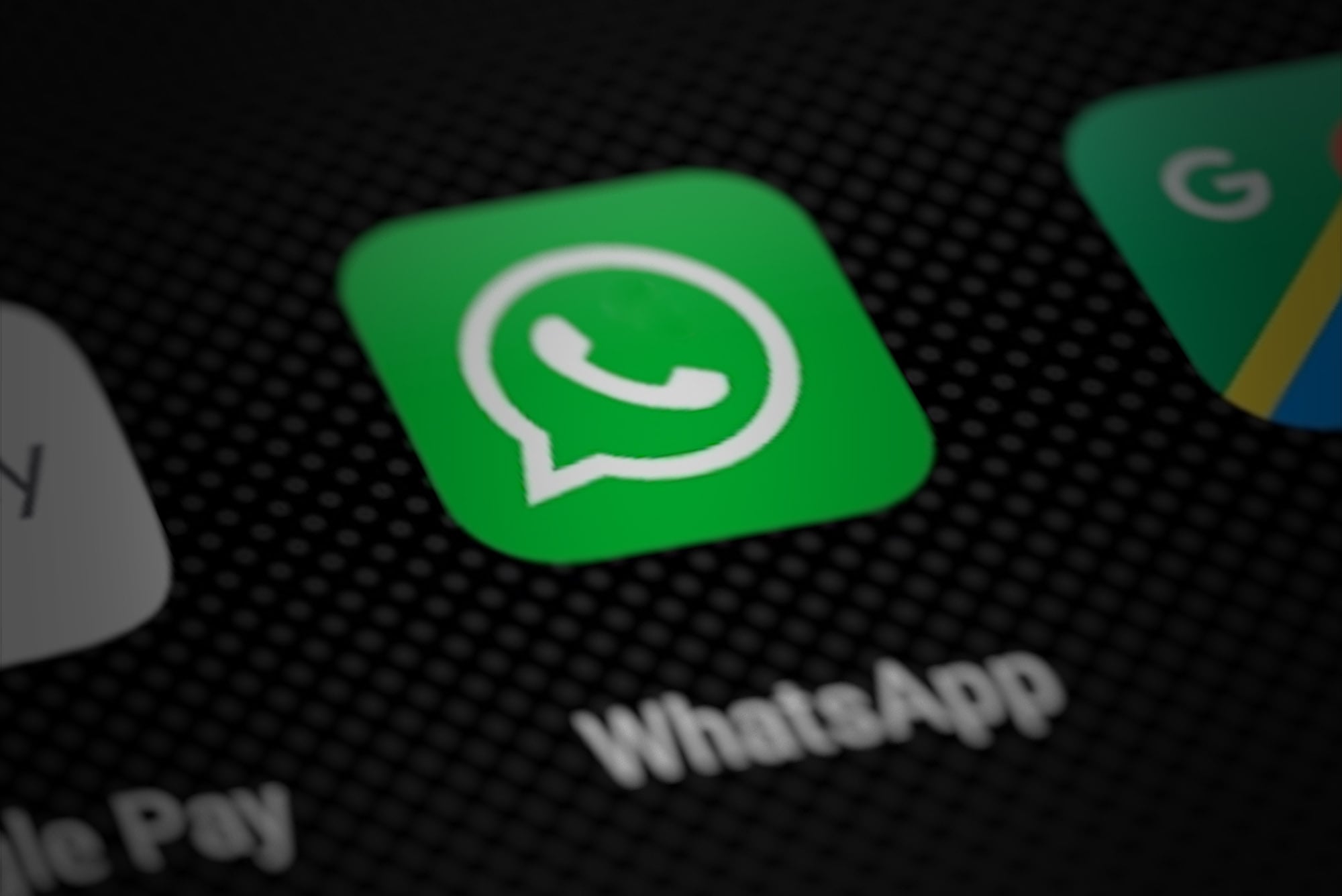 WhatsApp app icon on a smartphone screen